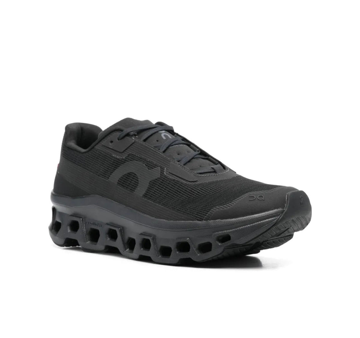 On Cloudmonster black - high-performance athletic footwear in Black with advanced cushioning