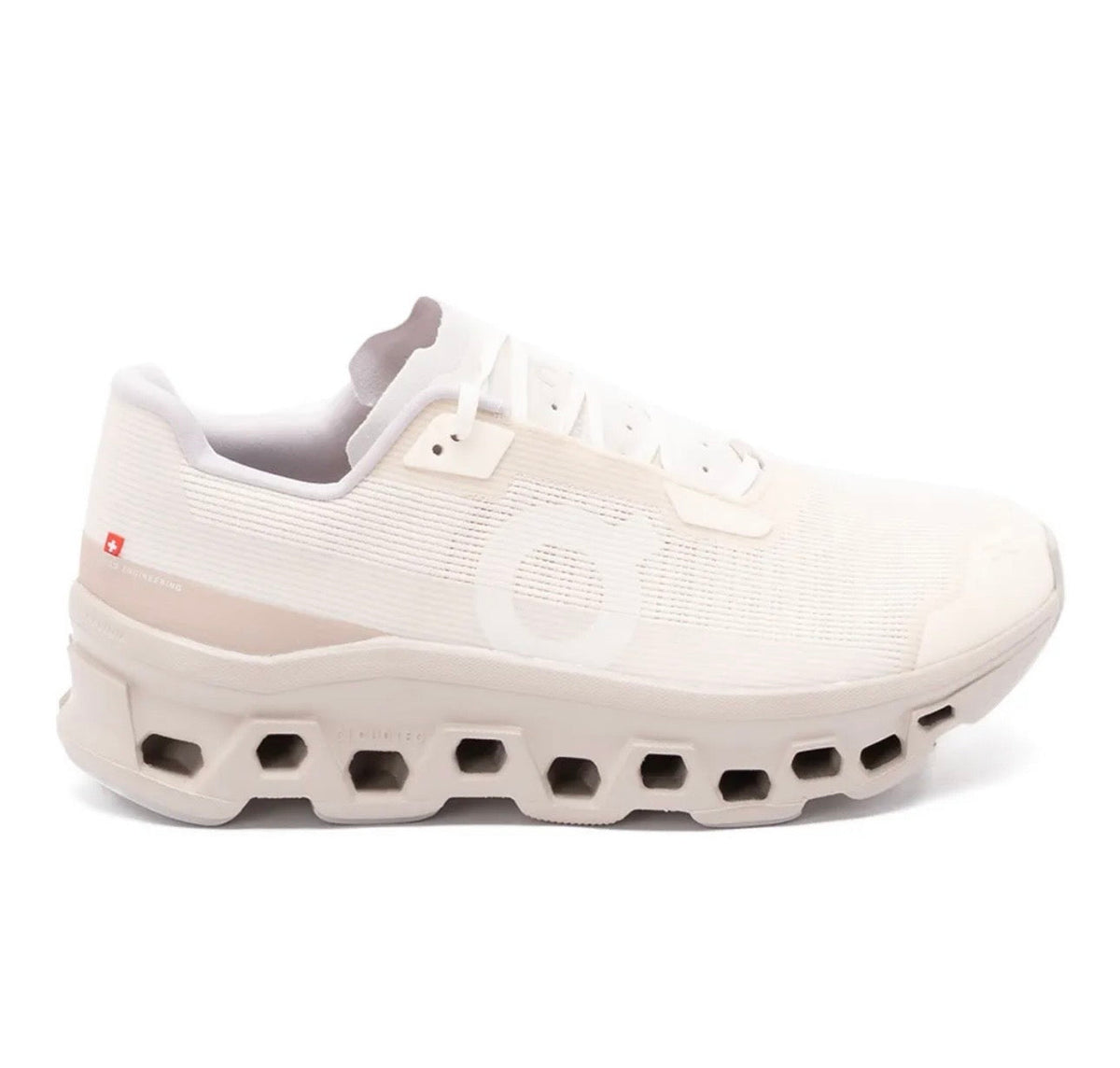 On Cloudmonster cream - high-performance athletic footwear with advanced cushioning